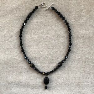 Black beaded pendant necklace